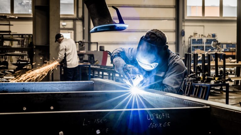 Welder working in factory